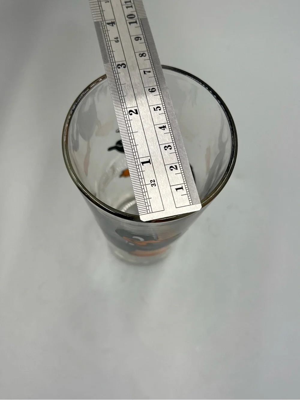 Pepsi Daffy Duck Clear Glass Tumbler with Black and Orange Artwork